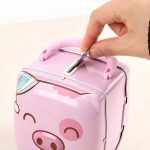 Boîte à économies cochon pour apprendre à épargner