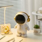 Tirelire amusante représentant un astronaute pour les petits