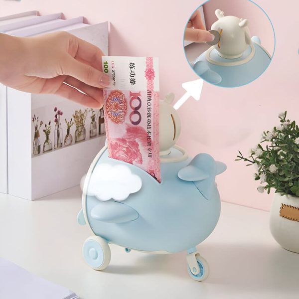 Tirelire pour enfant : avion coloré pour motiver l'épargne
