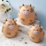Tirelire vache originale pour apprendre à épargner