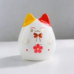 Accessoire décoratif : tirelire en céramique chat