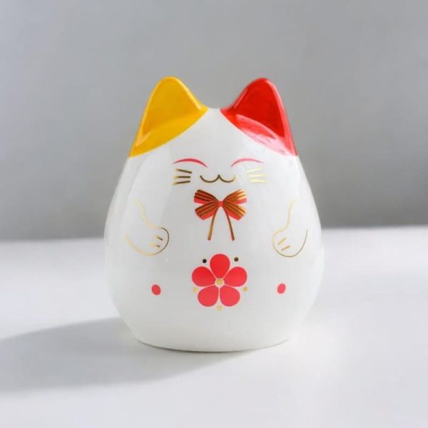 Accessoire décoratif : tirelire en céramique chat