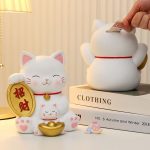 Tirelire féline en forme de patte de chat