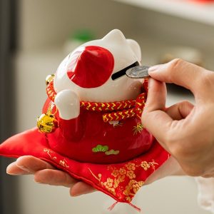 Tirelire en céramique représentant un chat porte-bonheur