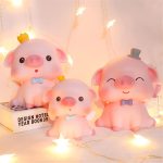 Tirelire cochon avec ailes d'ange, design ludique