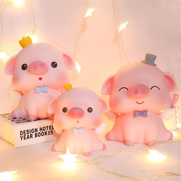 Tirelire cochon avec ailes d'ange, design ludique