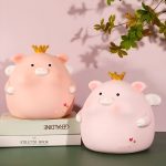 Tirelire en forme de cochon couronné