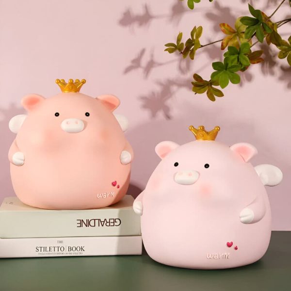 Tirelire en forme de cochon couronné