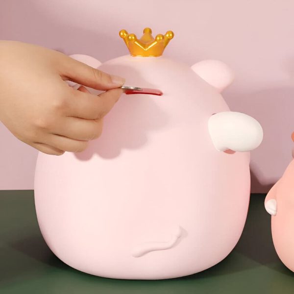 Accessoire ludique : tirelire cochon couronnée