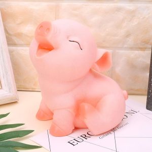 Tirelire en forme de cochon colorée