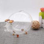 Accessoire de décoration : tirelire en verre