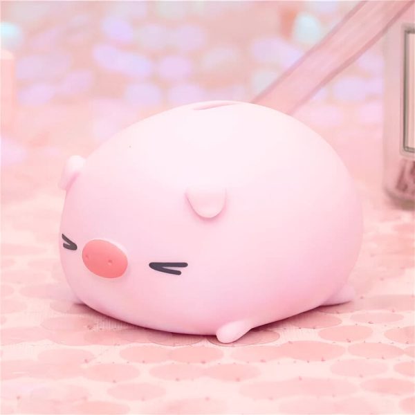 Tirelire cochon, pratique et décorative