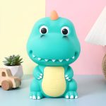 Accessoire ludique, tirelire dinosaure pour chambre d'enfant