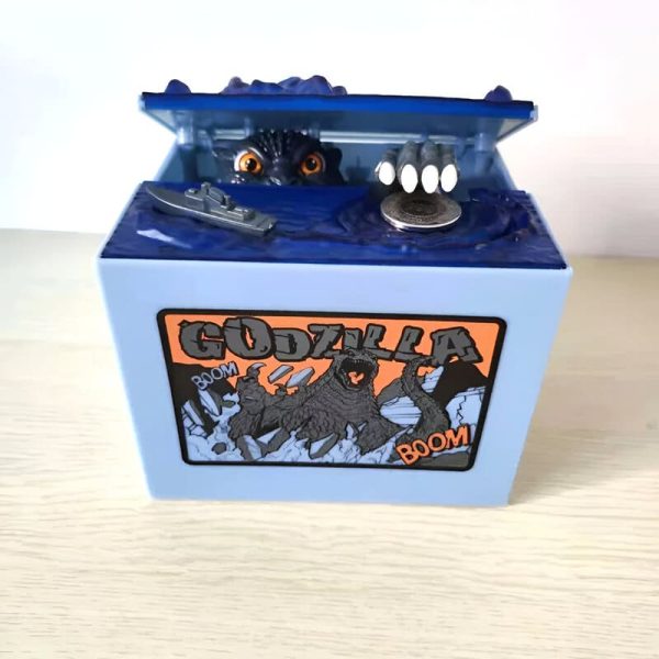 Tirelire enfant en forme de Godzilla, idéale pour épargner