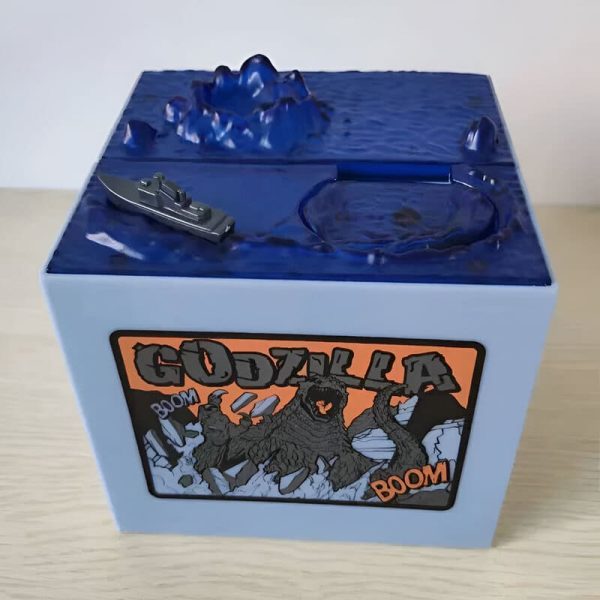 Tirelire amusante Godzilla, parfaite pour les petits épargnants