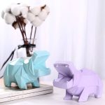 Tirelire animalière en forme d'hippopotame