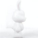 Économie ludique avec la tirelire lapin blanc