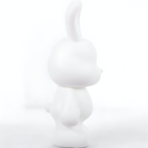 Économie ludique avec la tirelire lapin blanc