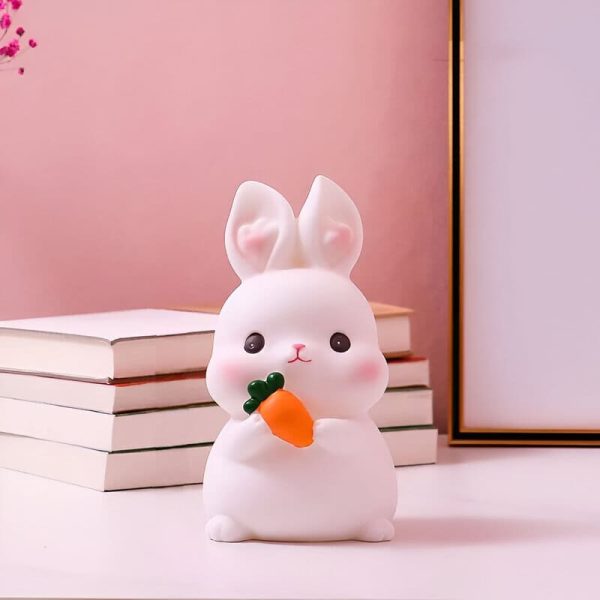 Lapin rose tirelire mignonne et pratique