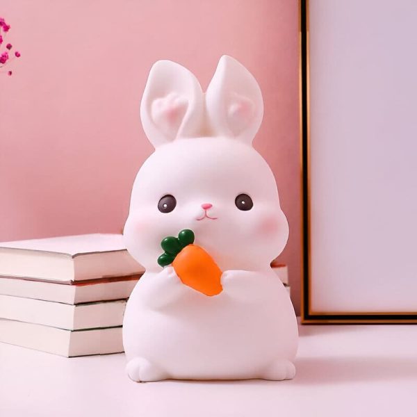 Tirelire amusante lapin rose pour épargner