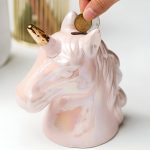 Tirelire Licorne en céramique dorée élégante