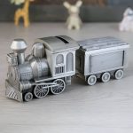 Tirelire locomotive en métal argenté