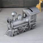 Tirelire locomotive argentée pour enfants