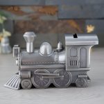 Tirelire locomotive originale en métal argenté