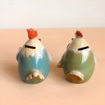 Poule tirelire en céramique blanche