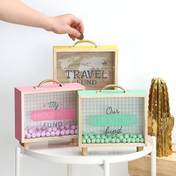 Tirelire voyage design transparent, idéale pour les petits budgets