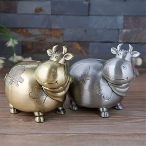 Tirelire en forme de vache pour collectionneurs